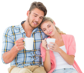 Attractive young couple sitting holding mugs