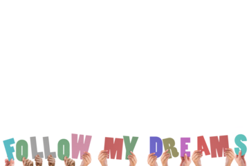 Cropped hands holding colorful words follow my dreams 