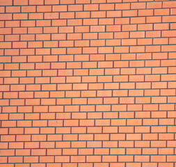 Red brick wall as an abstract background. Texture