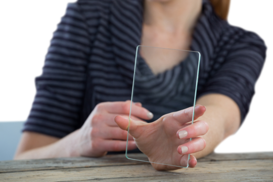 Mid section of businesswoman showing transparent glass interface