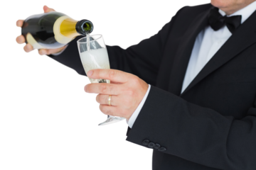 Man in suit pouring champagne