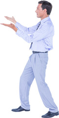 Businessman walking while gesturing with hands