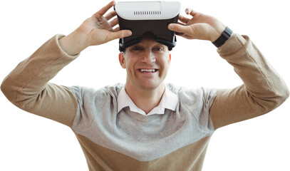 Portrait of smiling man holding virtual reality glasses