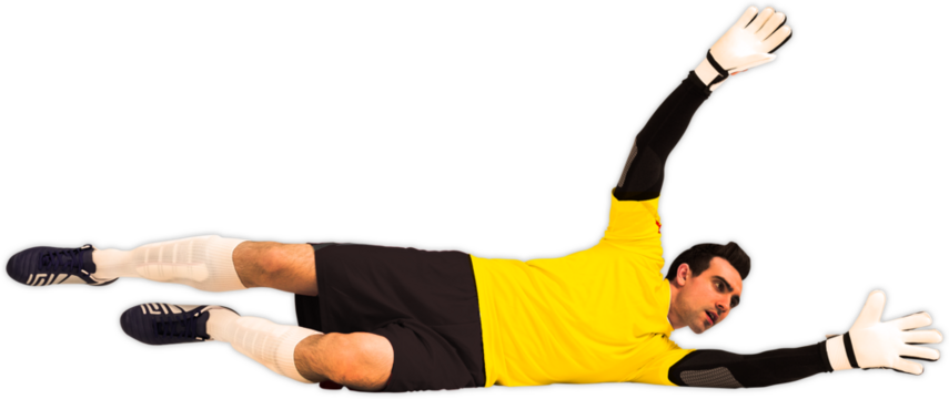 Goalkeeper in yellow making a save