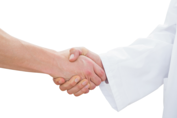 Closeup of a doctor and patient shaking hands