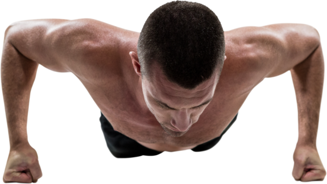 Fit shirtless athlete doing push ups