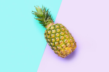Fresh ripe pineapple on color background