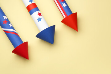 Firework rockets for Independence Day on beige background