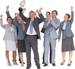 Excited business team cheering at camera with trophy