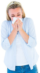 Sick woman sneezing in handkerchief