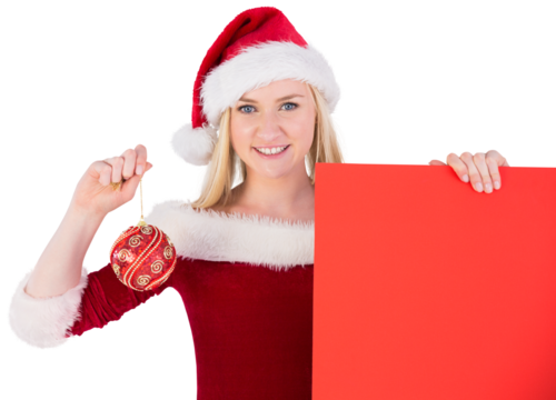 Festive cute blonde holding poster and bauble