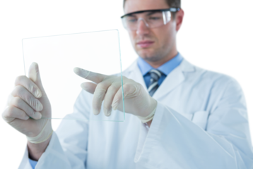 Male doctor holding futuristic glass