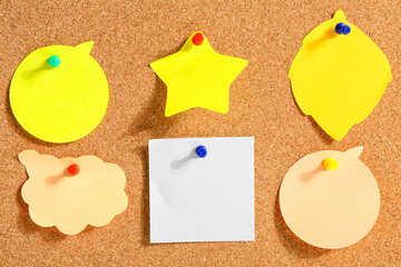 Pinned sticky notes on board