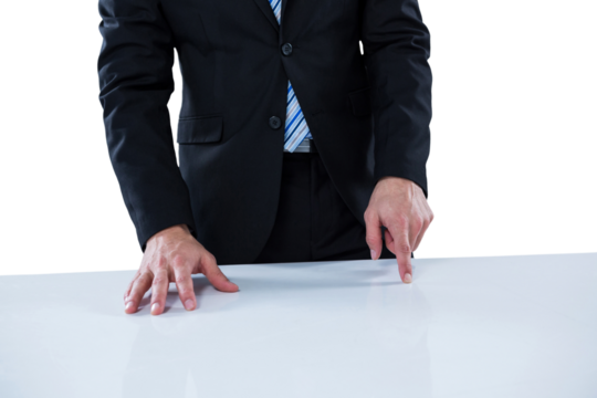 Midsection of businessman pretending to use invisible object