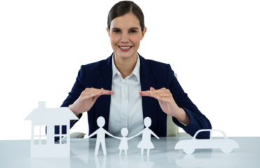 family in white paper with a woman in the background