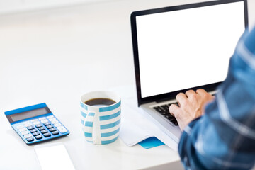 Cropped image of man using laptop