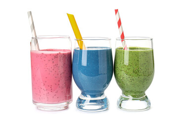 Glasses and bottles of different tasty smoothie with straws on white background