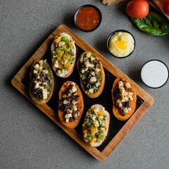 Crostini on bread with different toppings