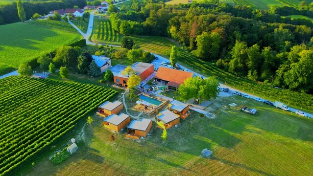 Aerial drone 4K footage of Prlekija in the morning during sunrise. Prlekija is a picturesque region in northeastern Slovenia known for its rolling hills, lush vineyards, and rich cultural heritage.