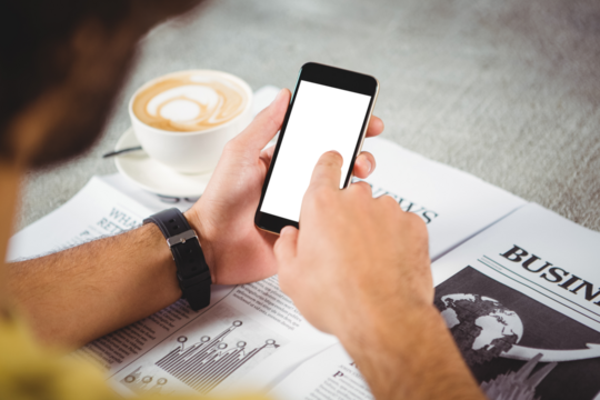 Hands of man holding mobile phone - Powered by Adobe