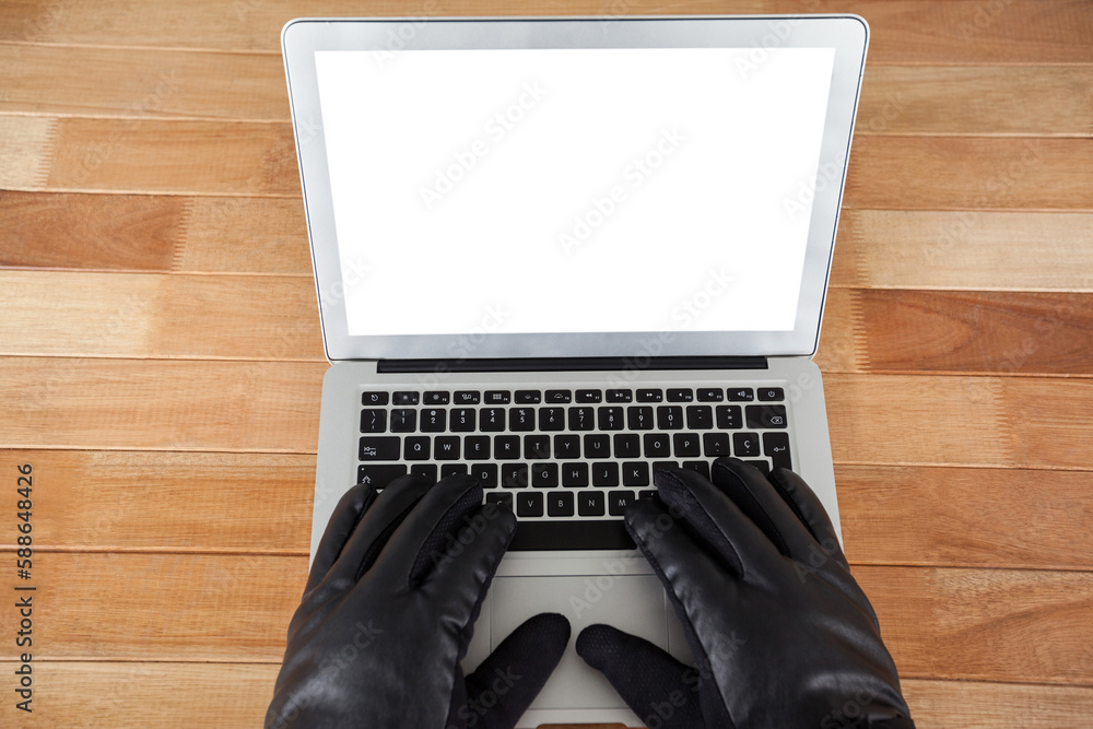 Poster cropped hands of hacker using laptop