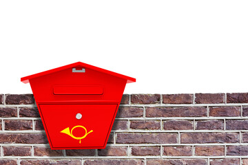 Post box on brick wall