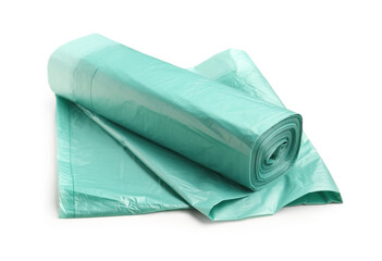 Green roll of garbage bags isolated on white background