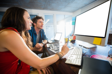 Colleagues using technology