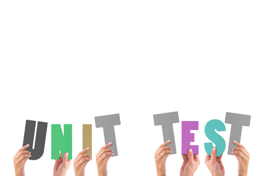 Colorful alphabet spelling unit test held up by people 