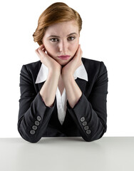 Redhead businesswoman looking unhappy