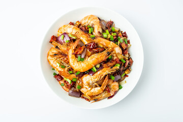 A plate of spicy shrimp on a white background