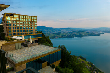 Hotel Five Stars B&uuml;rgenstock over Lake Lucerne and Mountain with Sunlight in B&uuml;rgenstock, Nidwalden, Switzerland.