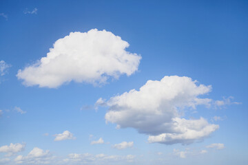 Naklejka na ściany i meble Blue sky and clouds on a sunny day
