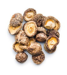 Dried shiitake mushrooms isolated on white background.
