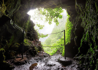 Tunnel in Madeira on walk hiking trail, Levada Caldeirao Verde