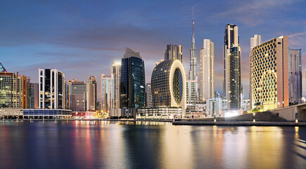 Panoramic view of Dubai Creek and night city skyline, United Arab Emirates, night Dubai ultra...