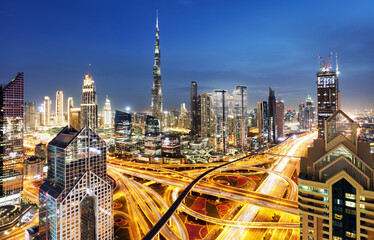 Naklejka na ściany i meble Panorama of skyline downtown Dubai - Aerial view at night, United Arab Emirates