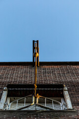 Copenhagen, Denmark An old  architectural detail, a chain and pulley system on a building in the Carlsberg district.