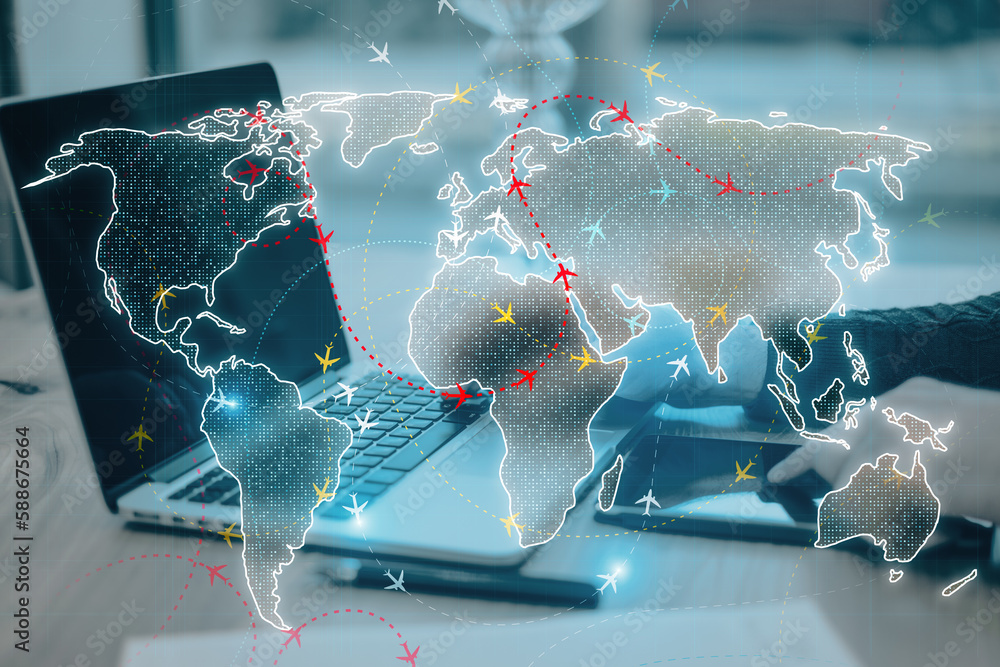 Poster Close up of workplace with male hands using devices with glowing digital map with ariplanes on blurry background. Flight routes network and global transportation. Double exposure.