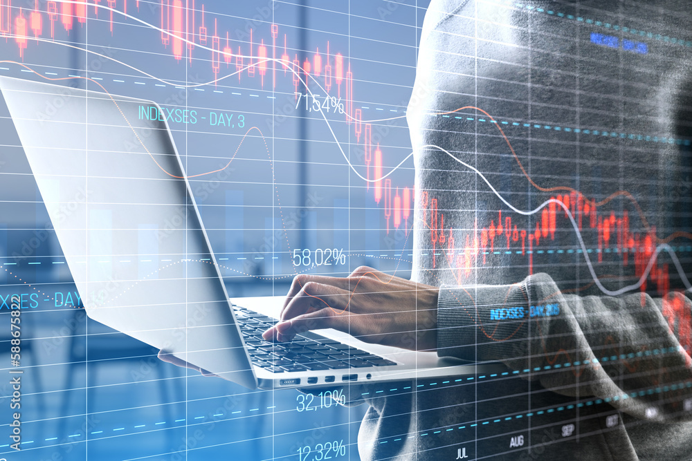 Poster close up of hacker in hoodie using laptop with falling red crisis forex chart on blurry office inter