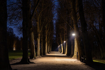 Copenhagen, Denmark An illumninated path at night in the Frederiksberg Have, or Fredewriksberg...