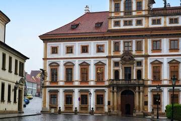 Fototapeta na wymiar Old street with Tuscan palace (Toskánský palác) in Prague, Czech Republic. 