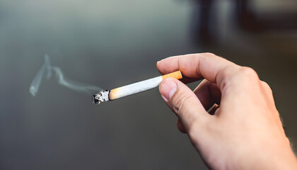 One hand holds a cigarette. Space for text.