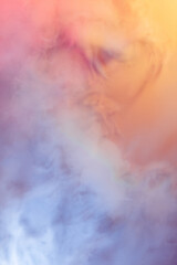 Colorful abstract image of multicolored smoke spreading in neon colors. Design for gadgets wallpaper, background, advertising and design. Pastel colors. Creative vision. Smoke texture