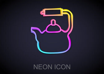 Obraz premium Glowing neon line Kettle with handle icon isolated on black background. Teapot icon. Vector