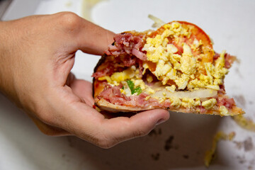 Traditional Brazilian pizza half Portuguese and half Calabrian