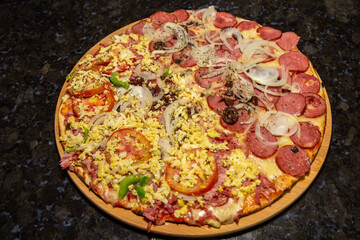 Traditional Brazilian pizza half Portuguese and half Calabrian