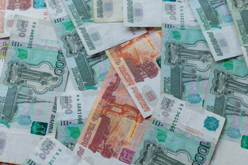 Russian money. Different denomination of bills. Close-up of Russian rubles. Finance concept. Money background and texture. Copy space. - obrazy, fototapety, plakaty