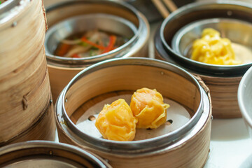 Dim sum in bamboo steamer, chinese cuisine