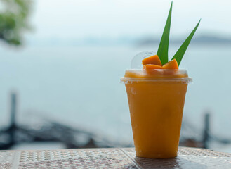Mango smoothie Tropical fruit concept.
